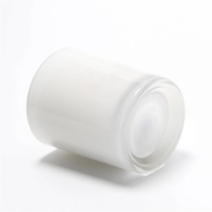 white tin candle containers